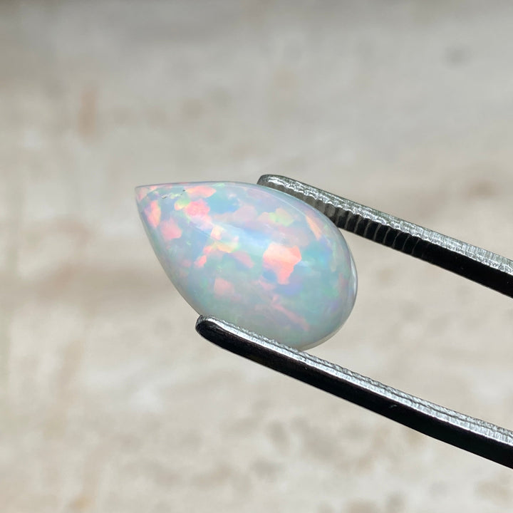 NATÜRLICHER WELO OPAL 7,40 CT CABOCHON PEAR